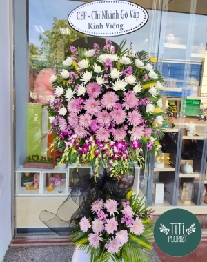 Lẵng hoa chia buồn  hồng tím 